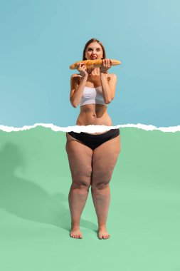Dieting and emotions. Young slim excited girl with body of plus-size woman with cellulite skin isolated on blue-green background. Weight loss, fitness, healthy eating, motivation concept. Poster for