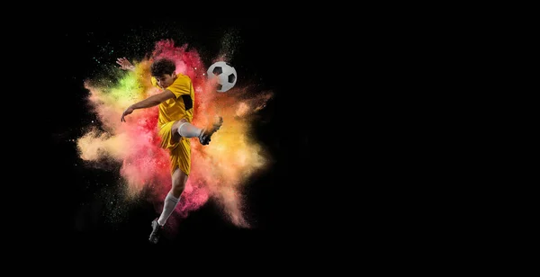 Male Soccer Football Player Kicking Ball Jump Isolated Dark Background — Zdjęcie stockowe