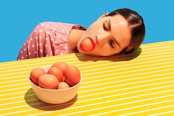 Creative Funny Image Young Woman Eggs Bright Yellow Tablecloth Isolated — Fotografie, imagine de stoc
