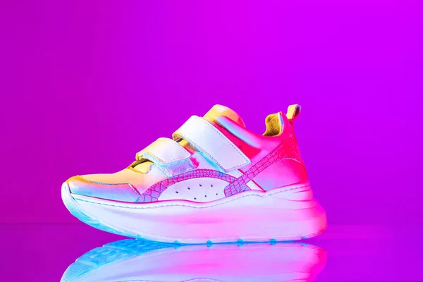Image Fashionable Sports Shoes Sneakers Isolated Colored Neon Background Urban — Foto de Stock