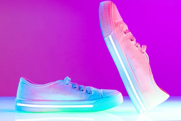 Female White Sports Shoes Sneakers Isolated Purple Neon Background Urban — Foto de Stock