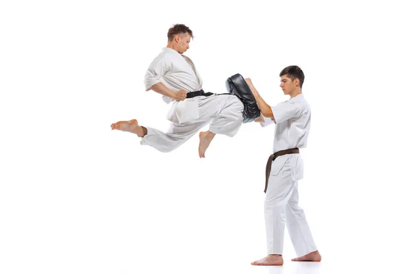 Shotokan Karate Two Athletes Karate Fighters Doboks Practicing Karate Isolated — Stock Photo, Image