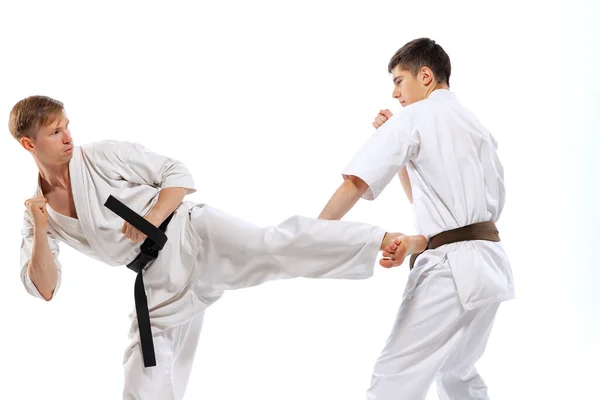 Shotokan Karate Two Athletes Karate Fighters Doboks Practicing Karate Isolated — Stock Photo, Image