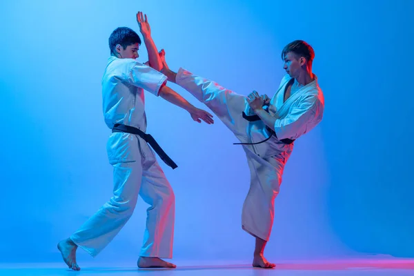 Karate Fight Studio Shot Sports Training Two Karatedo Fighters Doboks — Φωτογραφία Αρχείου