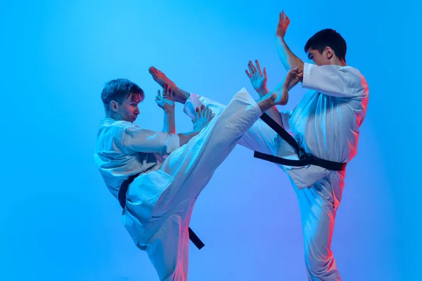 Karate Fight Studio Shot Sports Training Two Karatedo Fighters Doboks — Foto de Stock