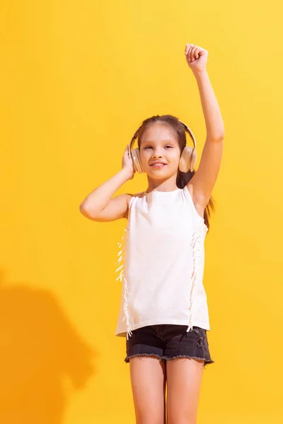 Dance Beautiful Small Girl Shorts Top Isolated Bright Yellow Background — Zdjęcie stockowe