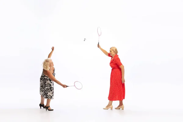 Playing Badminton Two Charming Senior Women Retro Vintage Dresses Posing — 스톡 사진
