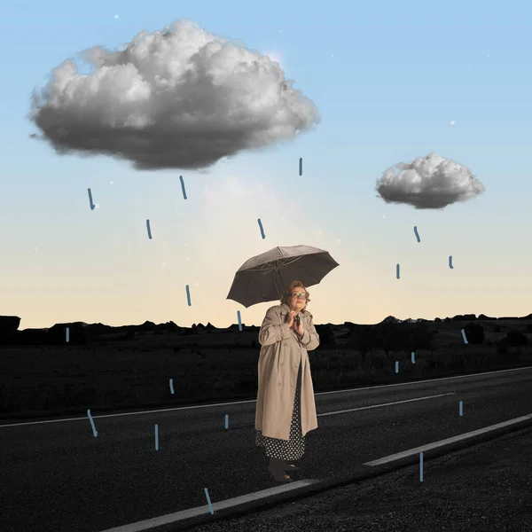 Loneliness, depression. Middle age woman in coat standing with umbrella under rain. Contemporary art collage. Inspiration, idea, trendy urban magazine style, fashion and creativity. Surrealism.