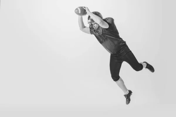 Catching Ball Jump Studio Shot American Football Player Training Ball — Stockfoto