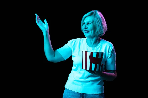 One Excited Senior Woman Modern Grandmother Holding Bucket Popcorn Isolated — Zdjęcie stockowe