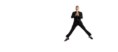 Meditation. Flyer with image of young office worker in business suit in action isolated over white background. Finance, aspiration, business, job concept. copyspace for ad
