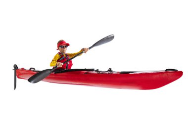Kids and sport. Beginner kayaker in red canoe, kayak with a life vest and a paddle isolated on white background. Concept of sport, nature, travel, active lifestyle. Copy space for ad, text, design