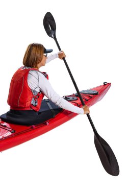 Back view. Young woman, sportsman in red canoe, kayak with a life vest and a paddle isolated on white background. Concept of sport, nature, travel, active lifestyle