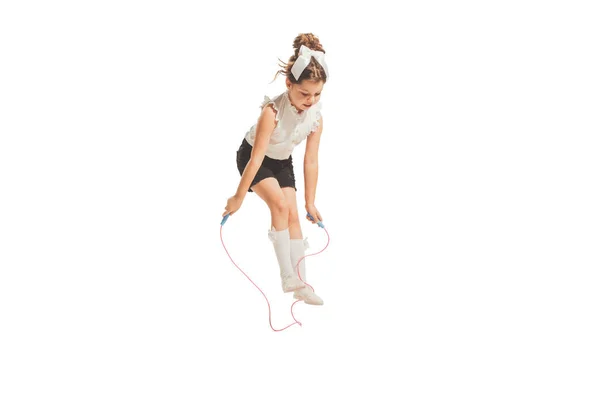 Cute Happy Little Girl Jumping Rope Isolated White Studio Background — Foto de Stock