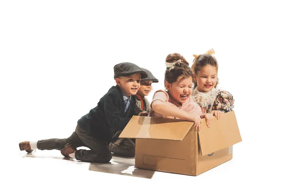 Riding Carton Box Group Happy Children Playing Together Isolated White —  Fotos de Stock