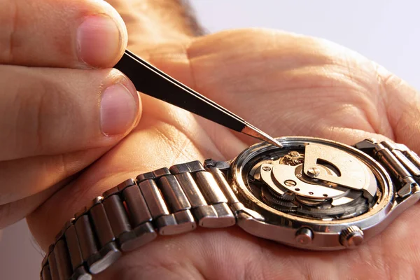 Watchmakers Job Closeup Male Hands Repairing Mechanical Watches Isolated White — Fotografia de Stock