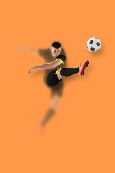 Portrait with blurring effect. Young male soccer or football player kicking ball for the goal in jump. Concept of sport, World Cup tournament, healthy lifestyle, professional sport, hobby, female