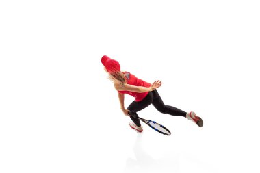 Aerial view. Training of female tennis player practicing power serving isolated on white background. Sports emotions, healthy lifestyle, fitness, sport, achievements concept.