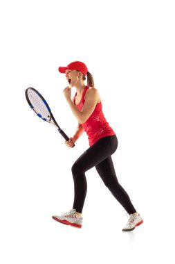Success. Excited young woman, tennis player shouting after sports win isolated on white background. Healthy lifestyle, fitness, sport, exercise concept. Emotions, facial expressions, achievement