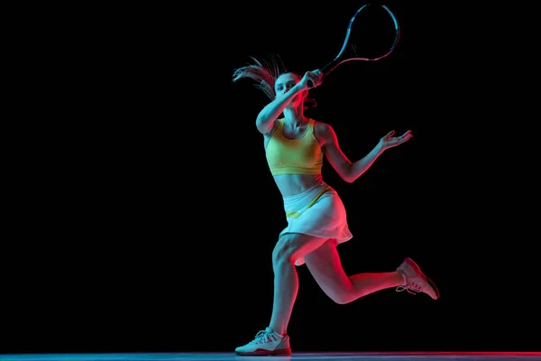 Young Woman Professional Tennis Player Training Isolated Blue Background Neon — Stockfoto