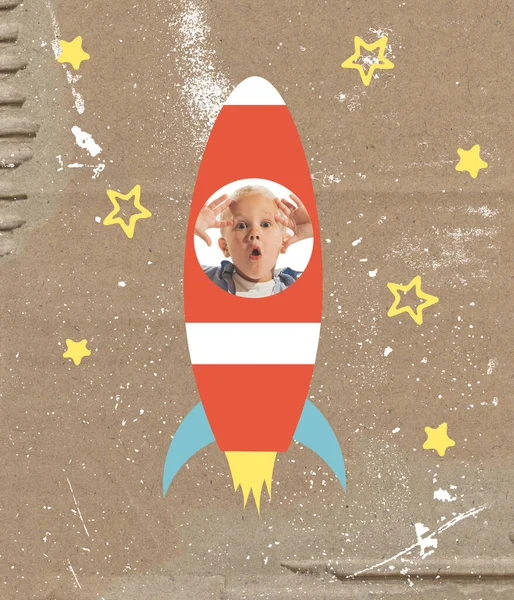 Art collage with cute school age wondered boy inside drawn rocket ship isolated on grey background. Childhood, dreams, studying, back to school concept. Copy space for ad.
