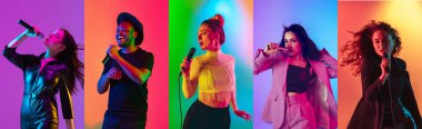 Music styles. Portraits of pop and rock musicians, singers with microphone singing isolated on purple background in neon light. Concept of emotions, art, ad and music. Collage, flyer