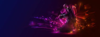 Viennese waltz, tango, slow foxtrot. Young beautiful couple, man and woman dancing ballroom dance over dark background with colorful neon elements. Art, music, dance style concept. Open dance cup.
