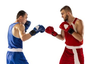 Rivals. Dynamic portrait of two professional boxer in sports uniform boxing isolated on white background. Concept of sport, competition, training, energy. Copy space for ad, text