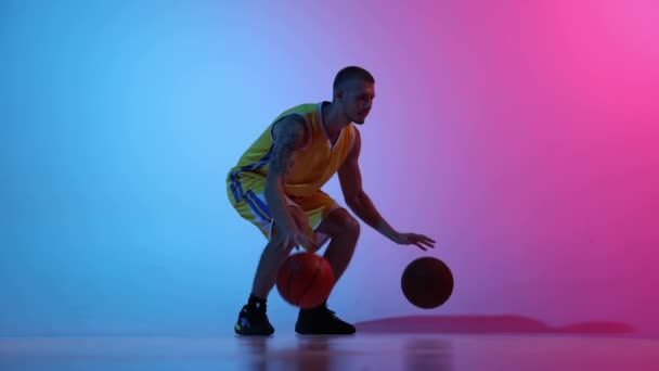 One Young Male Basketball Player Dribbling Two Basketball Balls Once — Video Stock