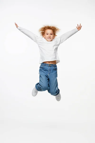 Happy Little Girl Kid White Long Sleeve Blouse Jeans Jumping — Stock Photo, Image