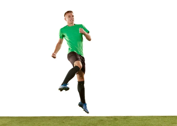 Jovem Jogador Futebol Profissional Saltando Isolado Fundo Estúdio Branco Conceito — Fotografia de Stock