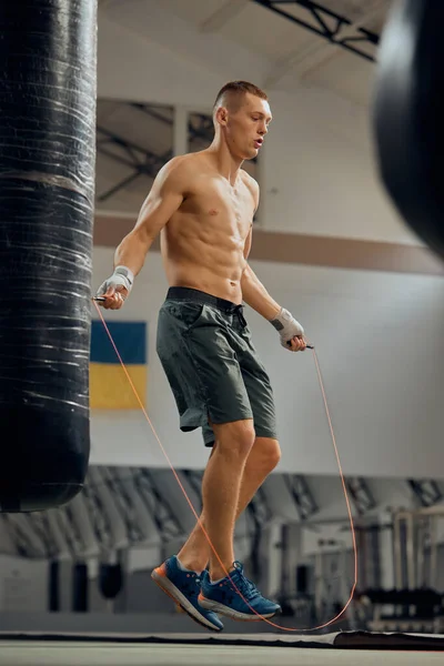 Young Muscle Man Boxer Jumps Rope Boxing Ring Sports Gym — Stock Photo, Image