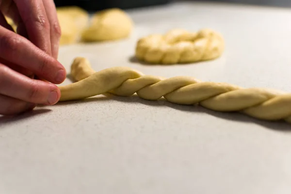 Female Hands Braiding Dough White Table Close Copy Space — Stockfoto