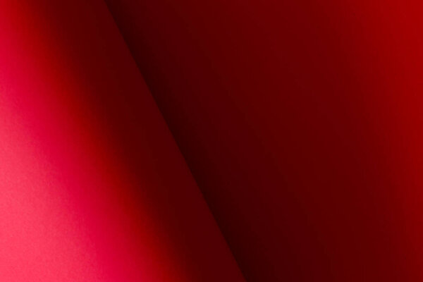 Abstract red folded colored paper background