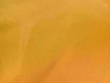 Top view, Abstract blurred orange yellow fabric pattern for background or illustration, Advertising  design graphic product, Elegant horizontal  
