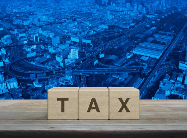 Tax Letter Wood Block Cubes Wooden Table Modern City Tower — Fotografia de Stock