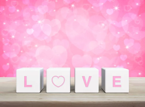 爱的信放在木制桌子上的白色方块上 上面有模糊的粉红的爱情背景 情人节的概念 — 图库照片