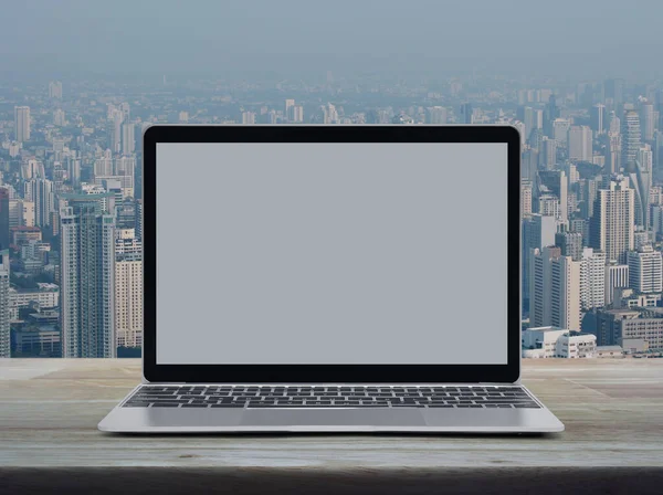 Modern Laptop Computer Blank Grey Screen Wooden Table City Tower — Zdjęcie stockowe