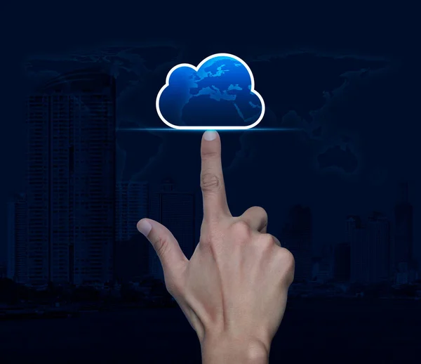 Hand click on cloud computing icon with copy space over world map, modern city tower and skyscraper, Technology cloud computing concept, Elements of this image furnished by NASA