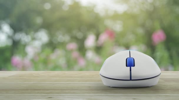 Learning Flat Icon Wireless Computer Mouse Wooden Table Blur Pink — Stockvideo