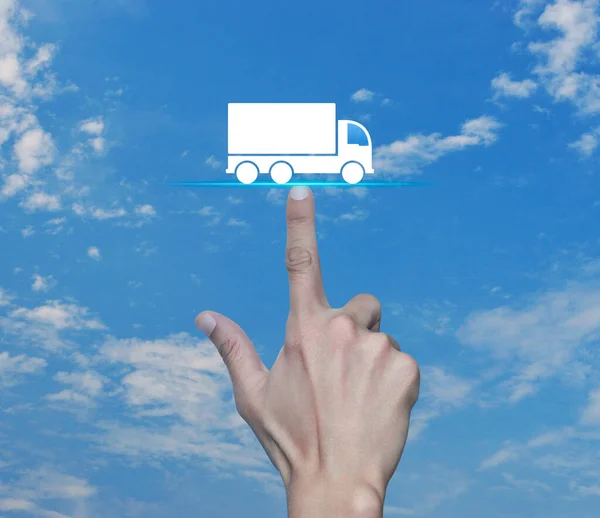 Hand pressing truck flat icon over blue sky with white clouds, Truck transportation service concept
