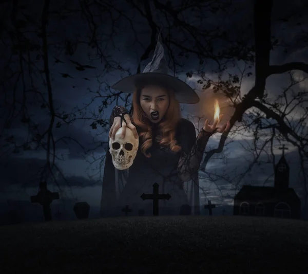 Halloween Witch Holding Skull Standing Grass Dead Tree Cross Birds — Stock Photo, Image
