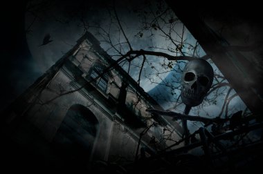 Human skull on wood cross over grunge castle, bird fly, full moon and cloudy spooky sky, Halloween mystery concept
