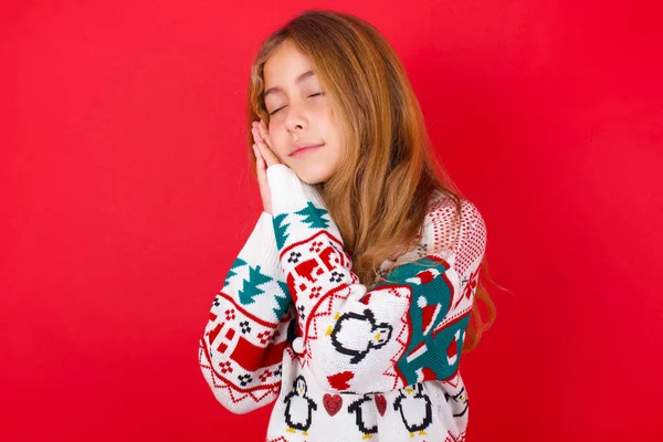 Beautiful Girl Wearing Christmas Sweater Leans Pressed Palms Closes Eyes — Stock Photo, Image