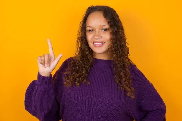 Pleasant Looking Woman Wearing Purple Sweater Standing Yellow Background Has — Stock Photo, Image