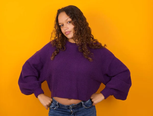 Funny Frustrated Woman Wearing Purple Sweater Standing Yellow Background Holding — Stock Photo, Image