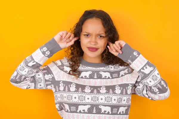 Happy Woman Wearing Christmas Sweater Agaist Yellow Studio Background Ignores — Stock Photo, Image