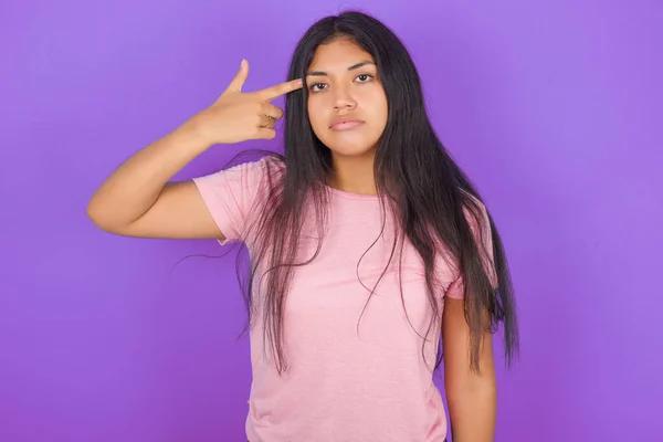 Unhappy Hispanic Brunette Girl Wearing Pink Shirt Purple Background Makes — Stock Photo, Image