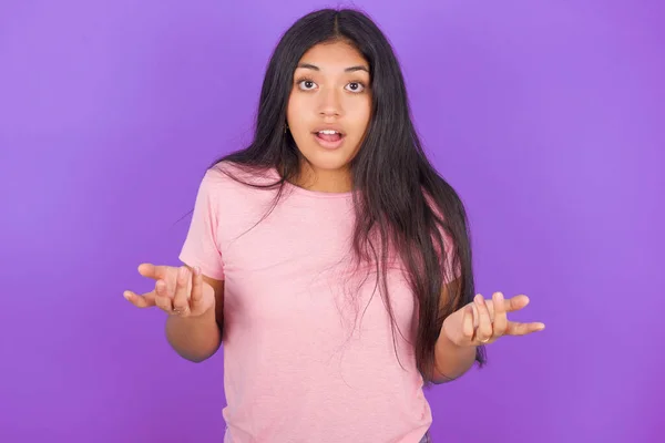 Frustrated Hispanic Brunette Girl Wearing Pink Shirt Purple Background Feels — Stock Photo, Image