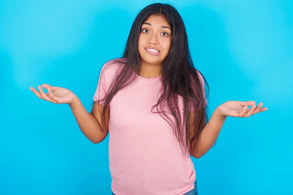 Clueless Woman Shrugs Shoulders Hesitation Faces Doubtful Situation Spreads Palms — Stock Photo, Image